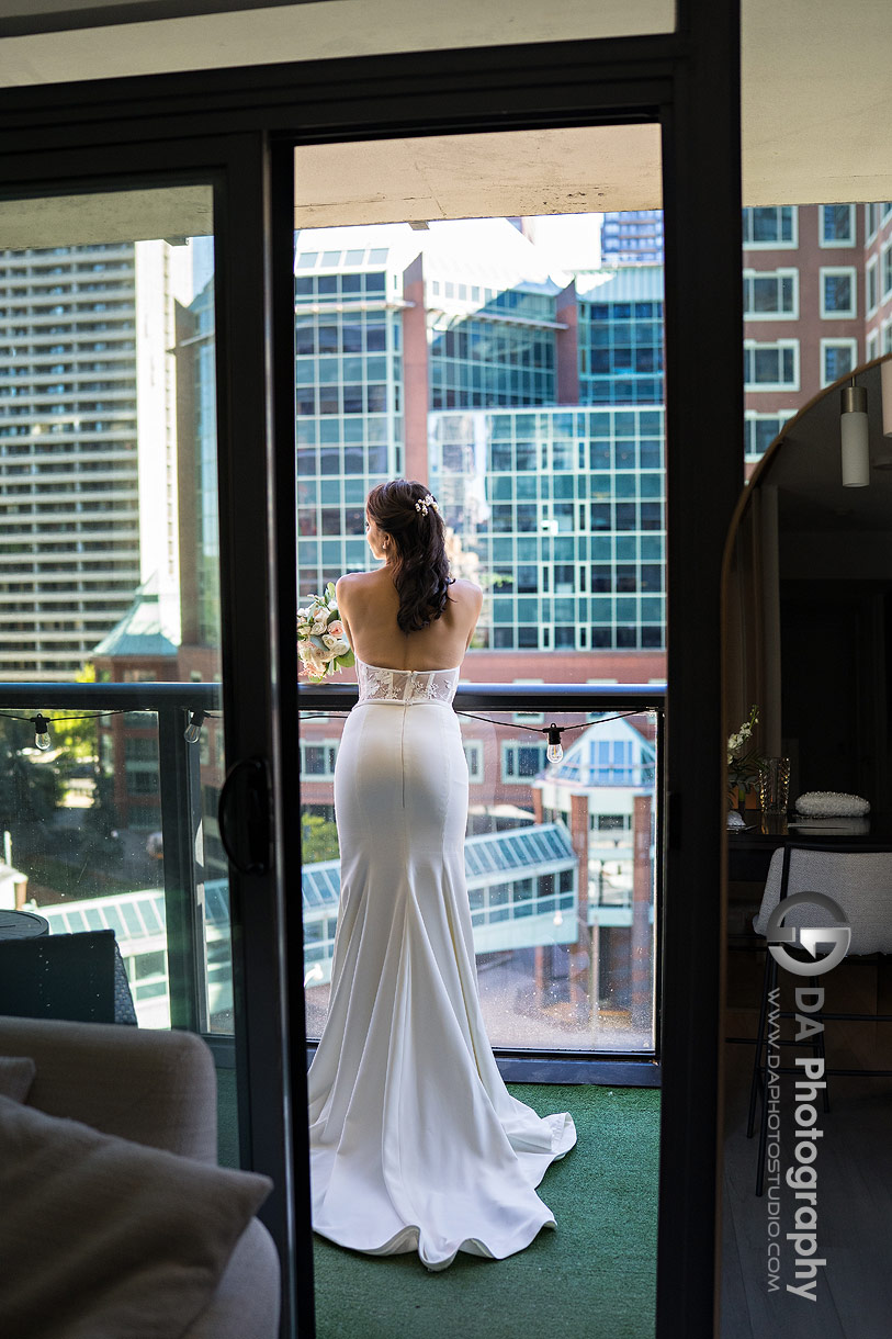Photo of a bride on a balcony Photo of a bride on a balcony