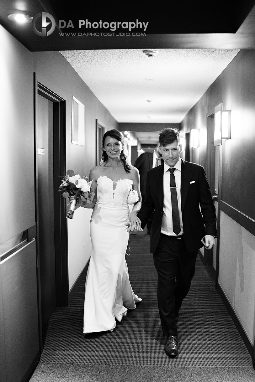 Bride and Groom walking in the building lobby Bride and Groom walking in the building lobby