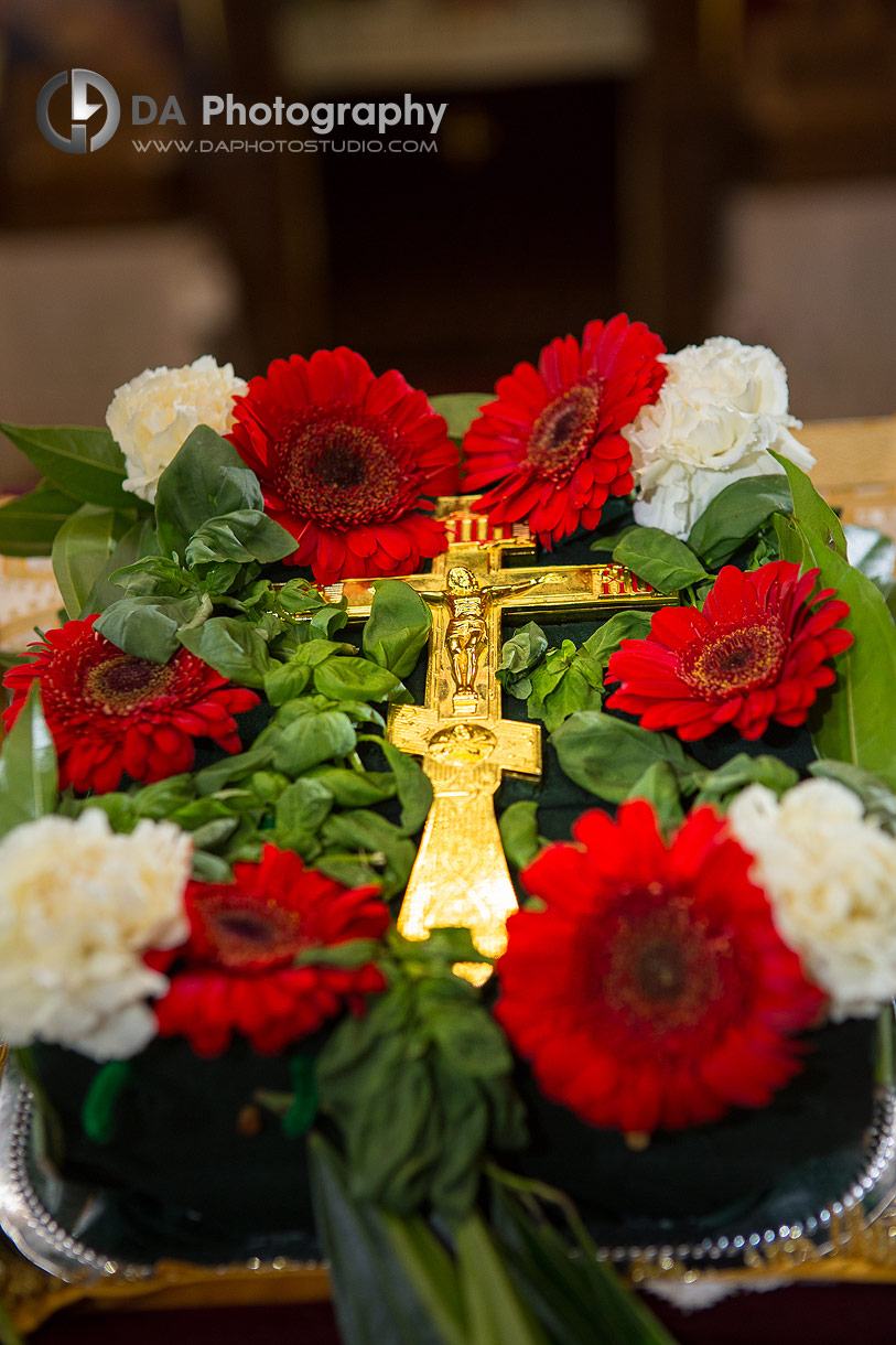 Photo of a Orthodox church wedding ceremony Cross in flowers Photo of a Orthodox church wedding ceremony Cross in flowers