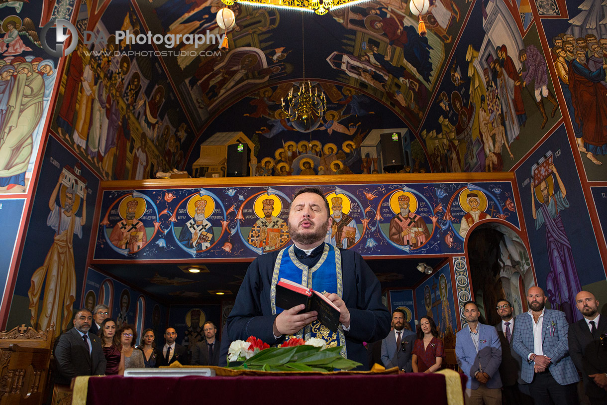 Photo of a Priest during Serbian Orthodox Wedding Ceremony in MIlton Photo of a Priest during Serbian Orthodox Wedding Ceremony in MIlton