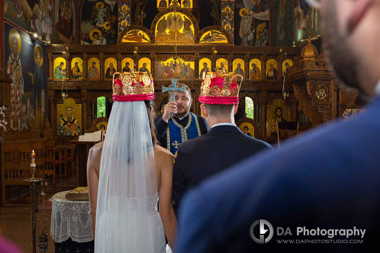 Bride and Groom at a Wedding Ceremony at Serbian Orthodox Monastery, Holy Transfiguration Bride and Groom at a Wedding Ceremony at Serbian Orthodox Monastery, Holy Transfiguration
