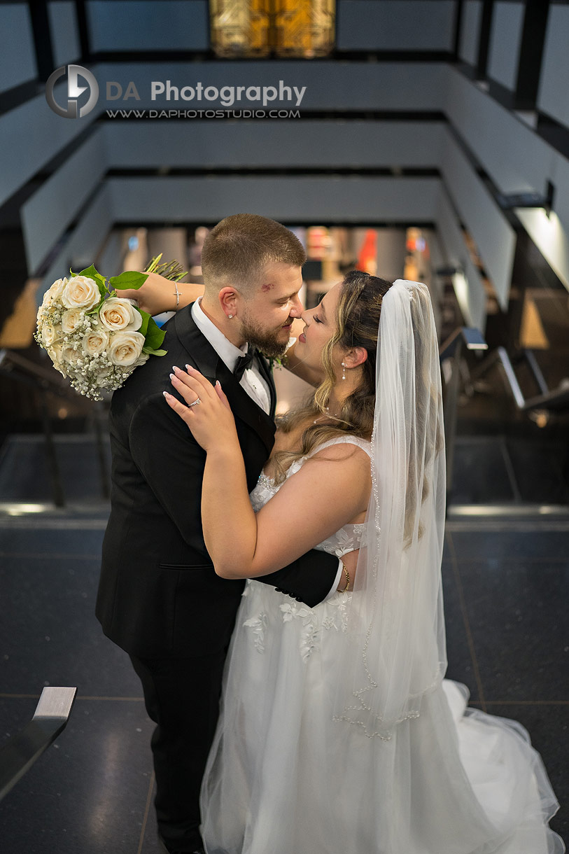 Photo of a bride and groom on a staircase Photo of a bride and groom on a staircase