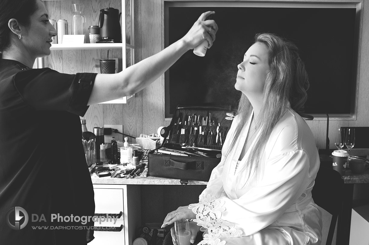 Bride getting makeup done at Pearle Hotel and Spa