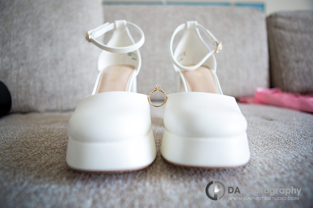 Photograph of a wedding ring on a shoes at Pearle Hotel