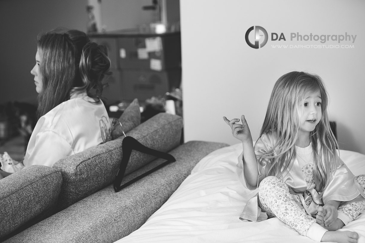 Photo of a Flower girl asking for her hair done as the bride
