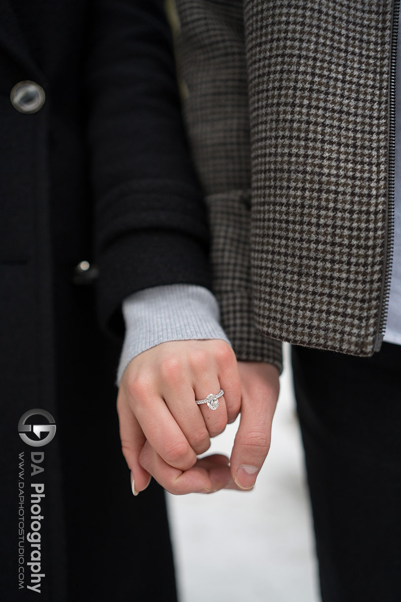 Photo of hands with an engagement ring in Elora